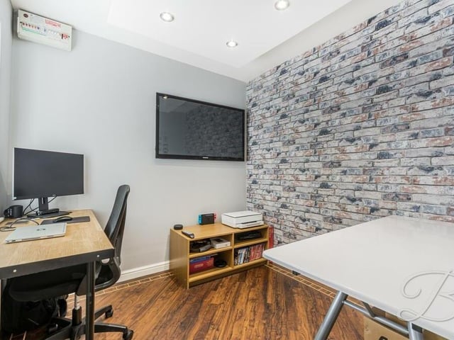 A bonus on the ground floor is this compact but versatile room, which is currently being utilised as a home office. It could be put to multiple other uses