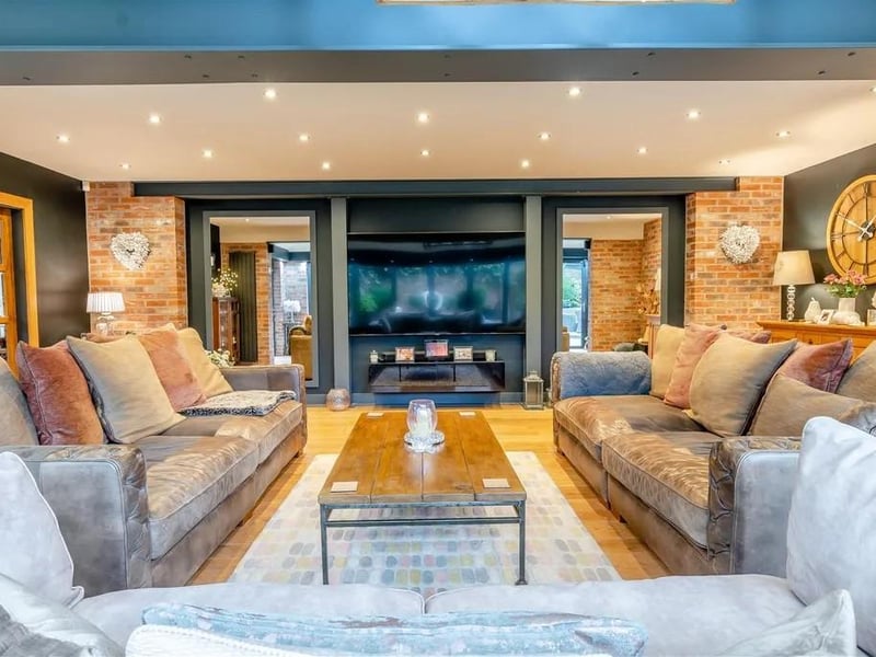 The home features a substantial and versatile family living space including a superb 565 sq ft living room.