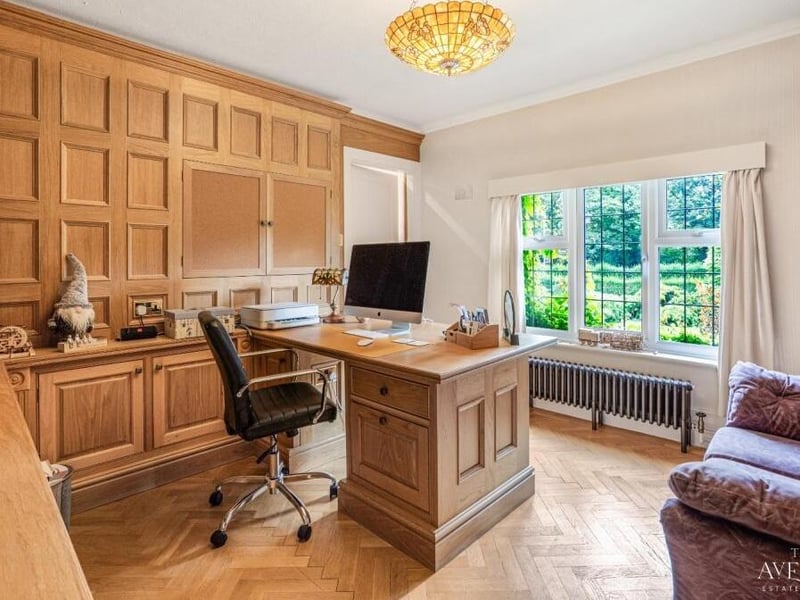 This area of the £1 million-plus house has been turned into a handy and attractive home office, overlooking the garden.