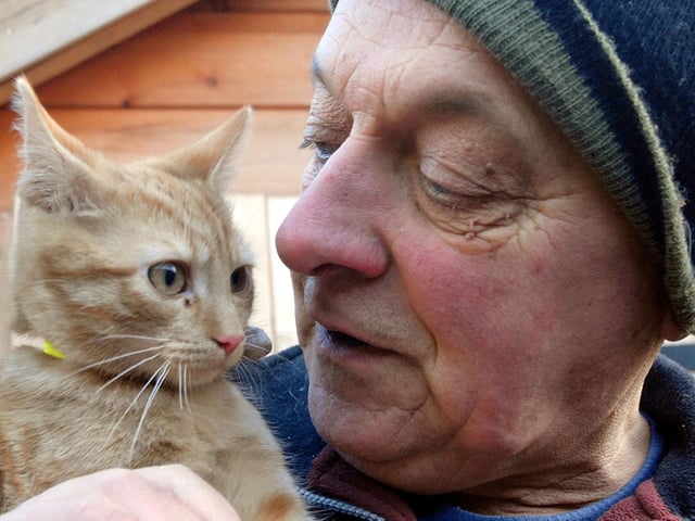Philip Clarke with Morris at the Kirkby Cats Home, 2009.