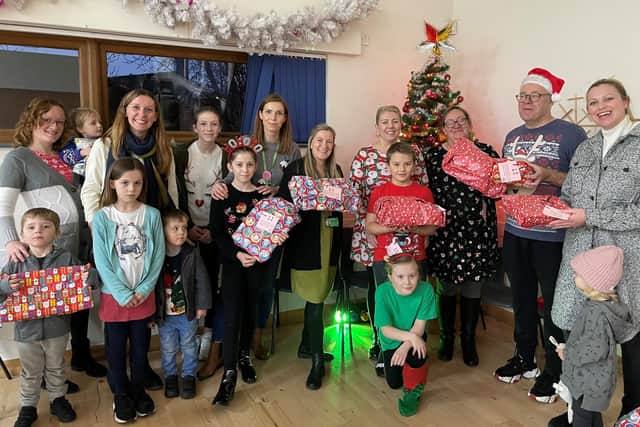 Ashfield children get festive gifts from builder’s donation