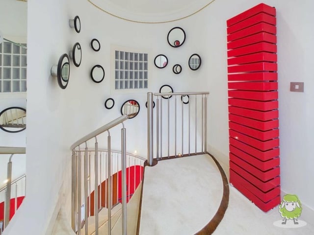 The colourful ambience of The Clock Tower continues at the top of the spiral staircase.