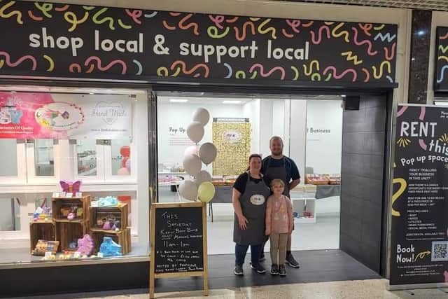 Katy Bacon, Dave Foulstone and daughter Freyja in their Pop-Up shop. The pair won a competition to be the first business in the newly opened Pop-Up shop in 2022.