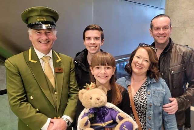 Sofia and her family at Harrods with her winning bear.
