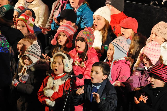 The choir of East Herrington Primary entertains the crowd with carols at the 2010 Sunderland Christmas Lights switch on.