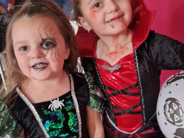 More witches dressed for Halloween fun.