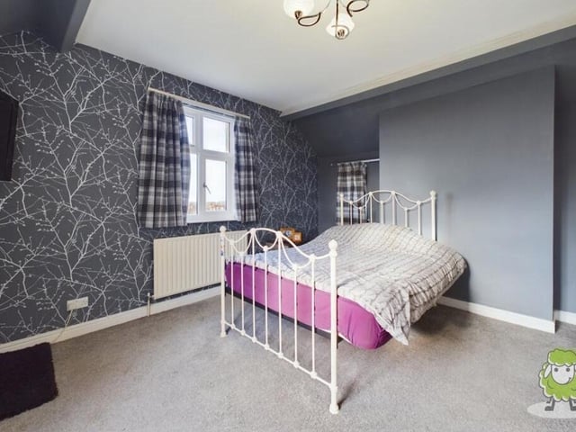 This second bedroom has a touch of elegance about it, don't you think?