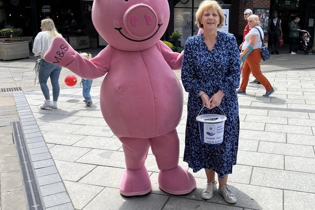Percy Pig stopped by to help the fundraising efforts of the shop.