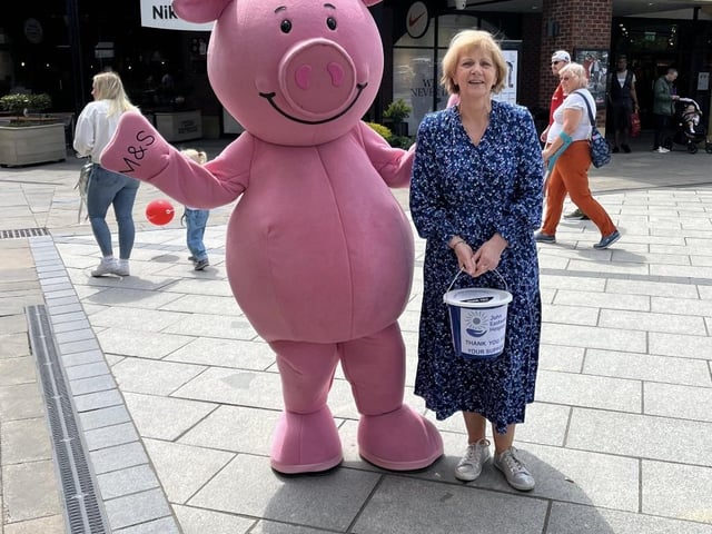 Percy Pig stopped by to help the fundraising efforts of the shop.