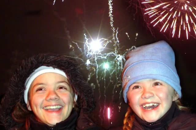 Sisters Jessica and Geri Wooff, aged 13 and seven, pictured at the 2006 Portland College bonfire and fireworks display in Mansfield