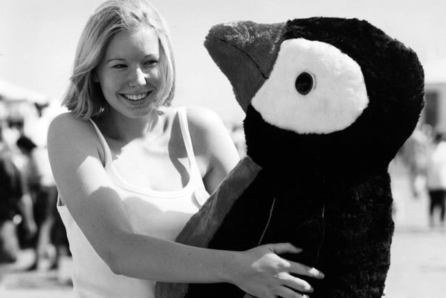 Jenny Connor from Purbrook enjoying the Southsea Show with her giant penguin in August 1994. The News PP4113