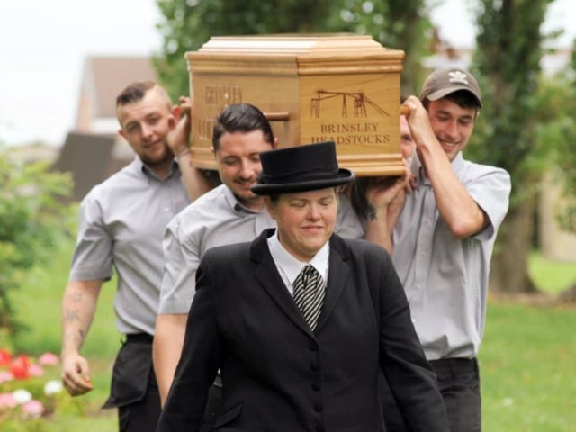 Joanne Hutsby, from Gillotts Funeral Directors, leads the team of coffin bearers on the the coffin walk from Brinsley to Greasley in 2018.