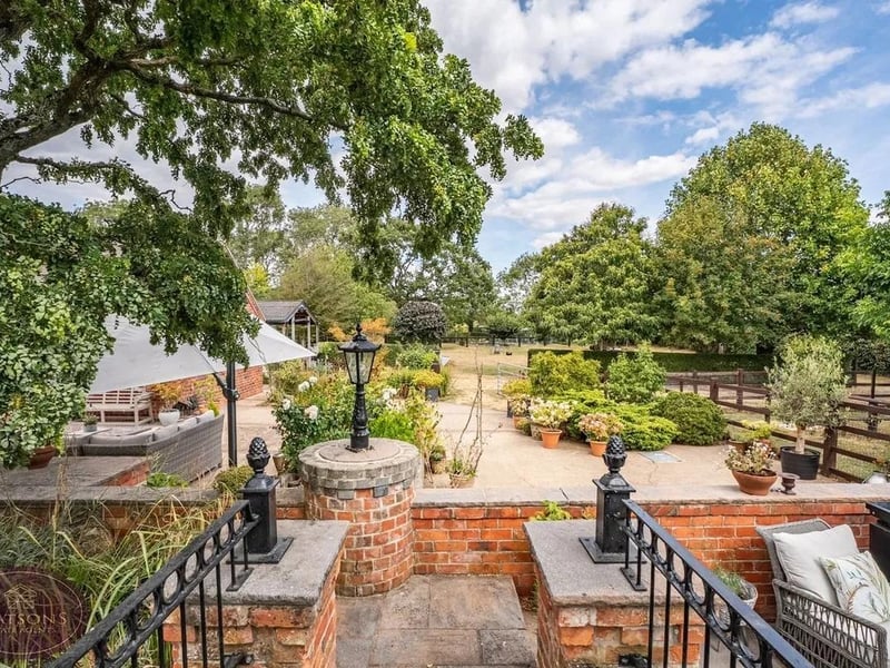The property occupies a wonderful setting extending to just over two acres, creating a genuine sense of space and privacy.