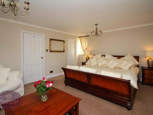 The largest of the four double bedrooms at the £700,000-plus property is the primary one, with double-glazed windows to the front and side. A terrific size, it has space for a sofa and lots of bedroom furniture.