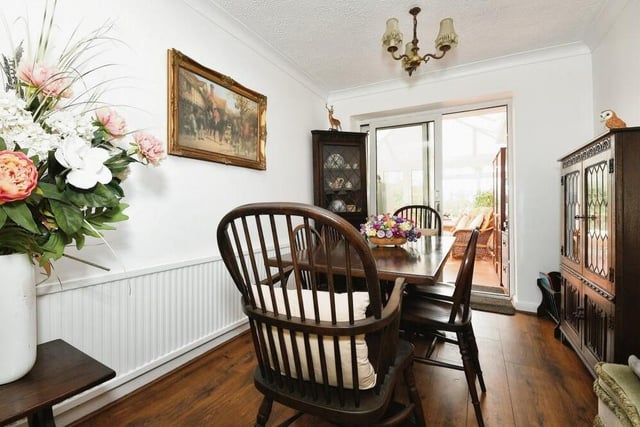 The dining room is a very pleasant corner of the bungalow. Ideal for quiet evening meals, with access to the conservatory at the back of the property.