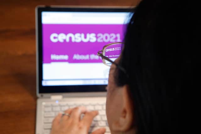 A woman logs on to the Census 2021 website.