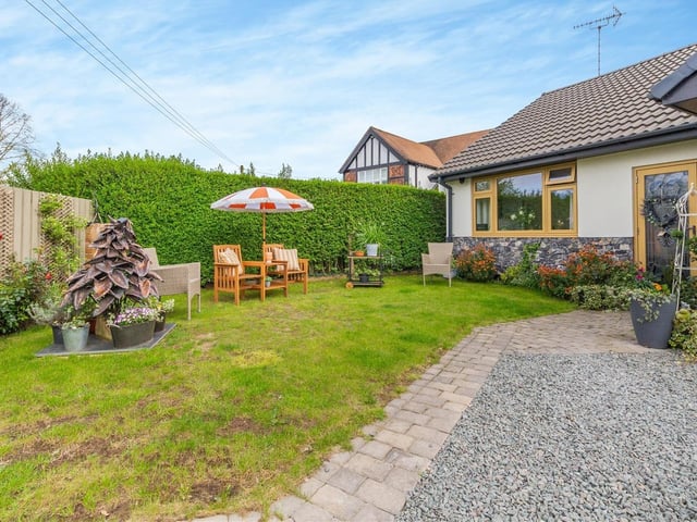 Back to the front of the £380,000-plus property now -- and here is a sweet seating area in the enclosed garden