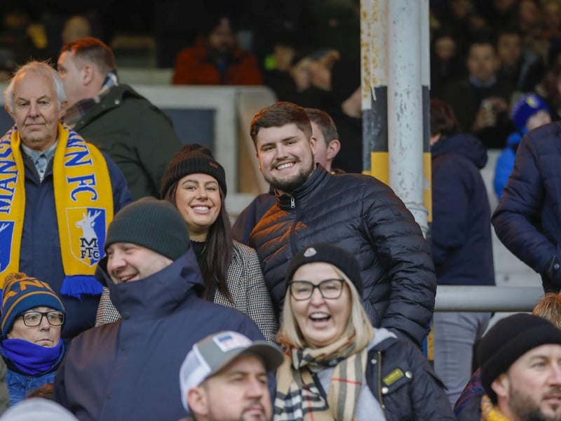 Mansfield Town fans watch the brilliant win at Peterborough United.