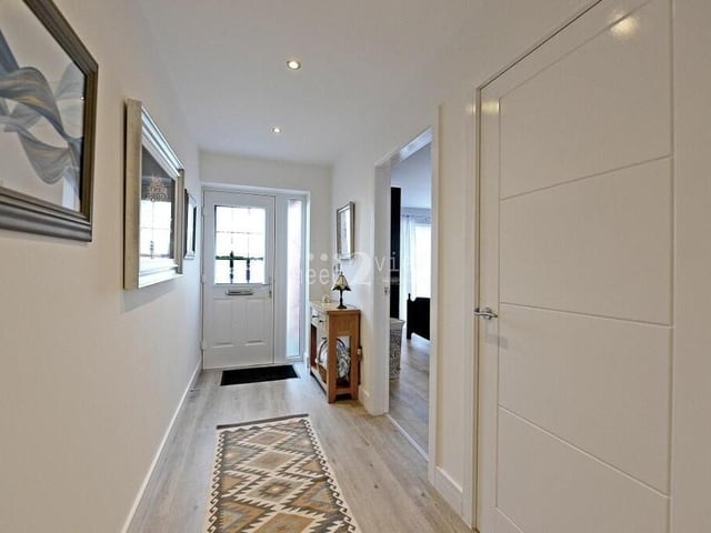 Once you have stepped through the front door, this welcoming hallway leads to all of the rooms at the £450,000 Forest Town bungalow. Underfloor heating and ceiling spotlights set the tone for the rest of your tour.