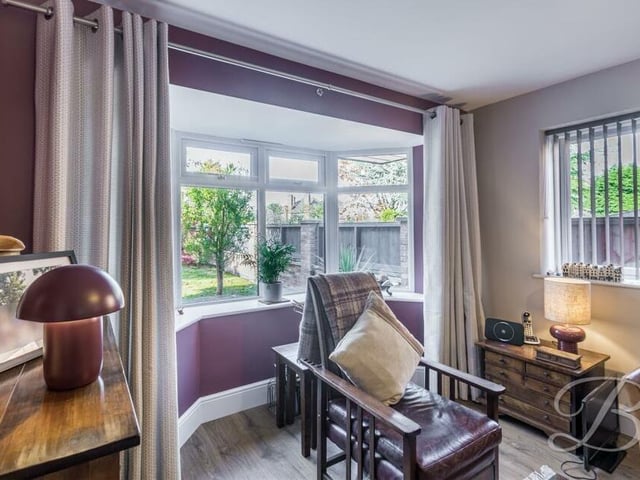 This big and brilliant bay window, which faces the front of the house, injects character into the second reception room. Two further windows to the side add even more natural light.