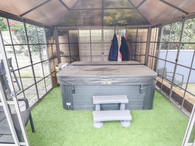 Let's take a peek inside the gazebo now -- to reveal this fabulous hot tub ready and waiting.