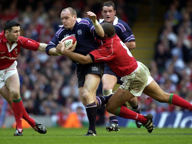 Current Scotland coach Gregor Townsend is tackled by Colin Jarvis of Wales. Townsend, who was playing in France for Castres at the time, was at stand-off for Scotland in Cardiff.