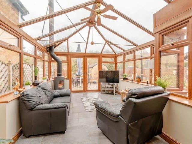 The conservatory at the Northfield Avenue property is south facing and a good size, with a glass roof and lovely views of the back garden. It also has a log-burner, electric underfloor heating and French doors leading out to the garden.