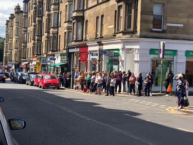 Locals lined the street before 11am this morning to pay their respects as Xander passed through Morningside