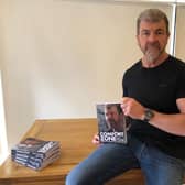 Former Nottinghamshire Police officer Nick Holmes, pictured with his book 'Comfort Zone'.