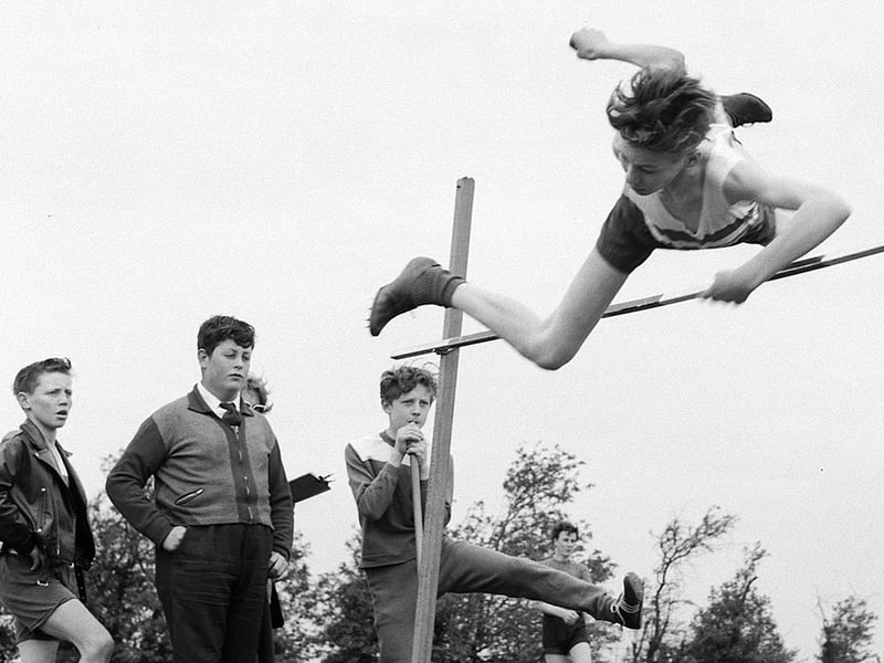 This most likely wouldn't be allowed these days. This pupil looks all set for a heavy fall after going over the bar in the high jump at Dukeries School in 1963