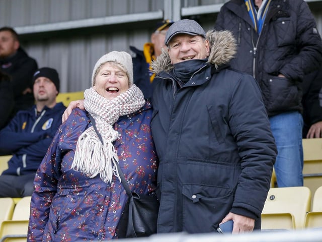 Mansfield fans at The EnviroVent Stadium for the match against Harrogate Town.