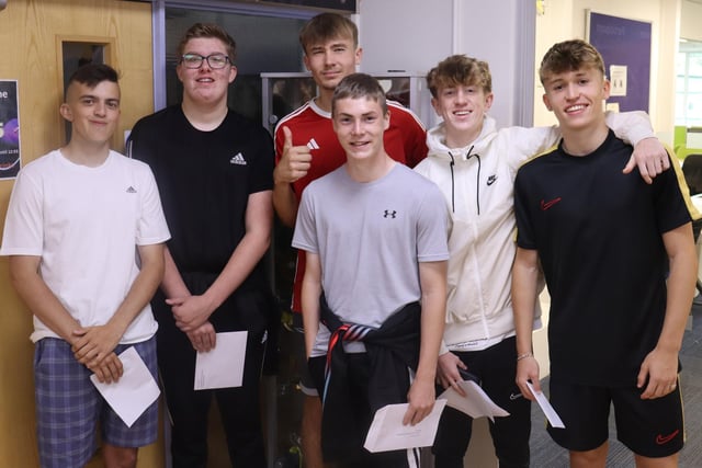 Students at Hall Park Academy celebrate their success on GCSE results day.