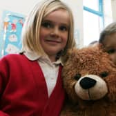 2007: Greasley Beauvale pupils Kennedy Smith, six, and Olivia Davis, six, try to guess the name of the bear.