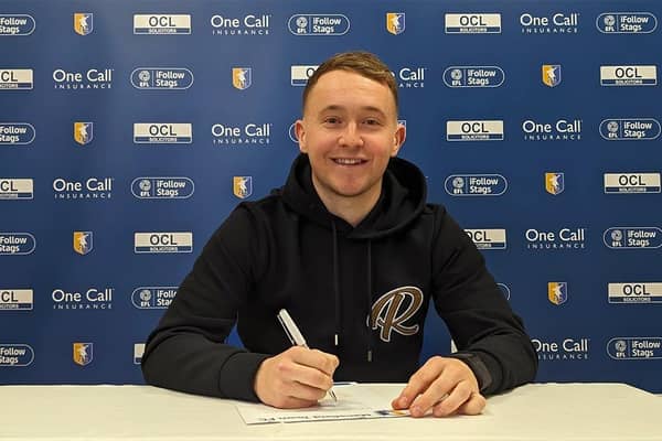 Louis Reed signs a new contract for Stags.