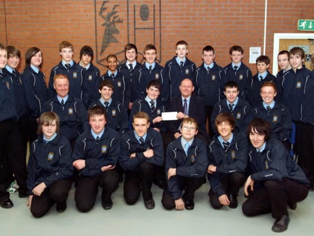Mansfield Rugby Club in 2010 receive a cheque.