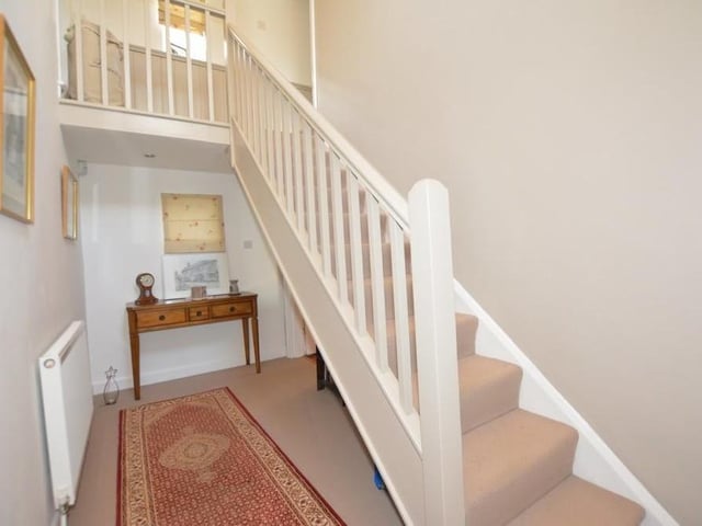The entrance hall houses the staircase that leads to the first floor of the £950,000 Southwell property.