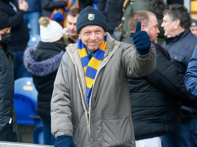 Mansfield Town fans at the One Call Stadium for the Emirates FA Cup third round match against Middlesbrough.