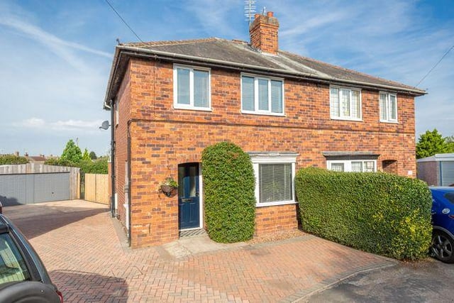 This three bedroom house has a generous size conservatory, featuring underfloor heating, fitted roof blinds and French doors to a large patio and family garden.