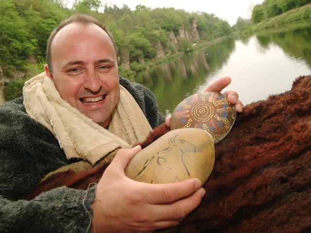 Creswell Crags Visitors Centre, Creswell. Professional story teller Andy Messer visited the centre to tell stories using costumes and props. Picture: Andy Messer at Crags Pond with just some of the props he used to tell stories.