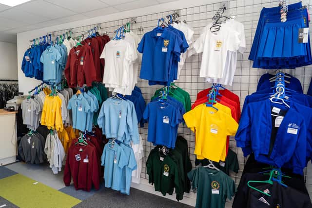 The cost of branded school uniform has been criticised.