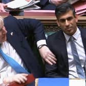 Prime Minister Boris Johnson, left, congratulates Chancellor of the Exchequer Rishi Sunak after he delivered his Spring Statement.