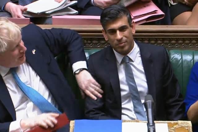 Prime Minister Boris Johnson, left, congratulates Chancellor of the Exchequer Rishi Sunak after he delivered his Spring Statement.