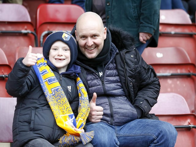 Travelling Stags fans watch the Sky Bet League 2 match against Bradford City.