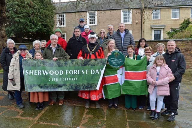 Richard Townsley reads the proclomation during the Sherwood Forest Day, which celebrated the lasting impact of Major Hayman Rooke on Mansfield Woodhouse. He is seen with councillors, residents and organisers.