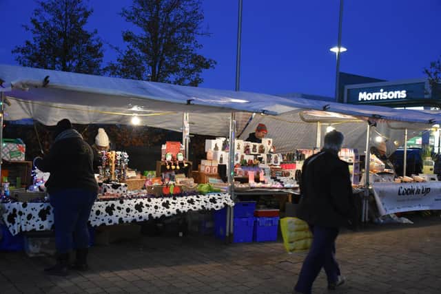 Event-goers cold visit an array of stalls selling Christmas wares