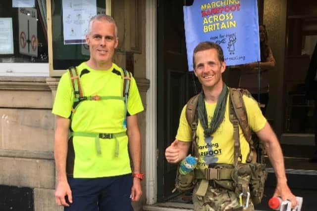 Chris Keightley, left, with 'barefoot soldier' Major Chris Brannigan