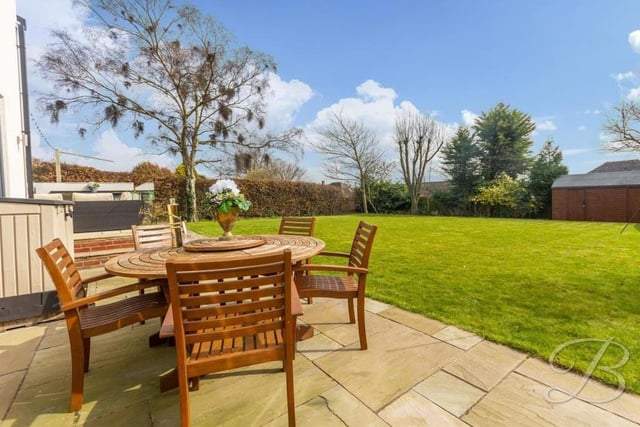 Imagine sitting in the sun in this beautifully landscaped, south-facing back garden.