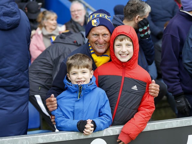 Mansfield Town fans enjoy the win over Gillingham on 11th Feb 2023.