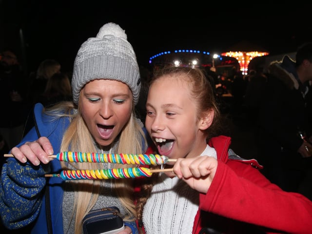 Tina McCabe and daughter Ashlee about to enjoy their twizzle sticks in 2019.