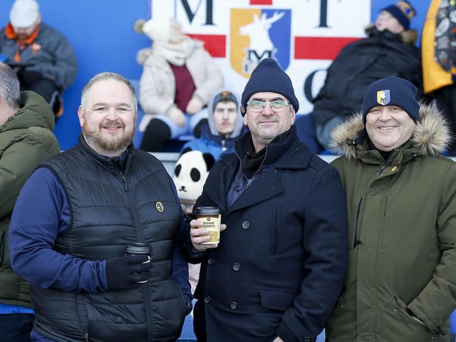 Stags fans watch the Sky Bet League 2 match against Crewe Alexandra at the One Call Stadium.